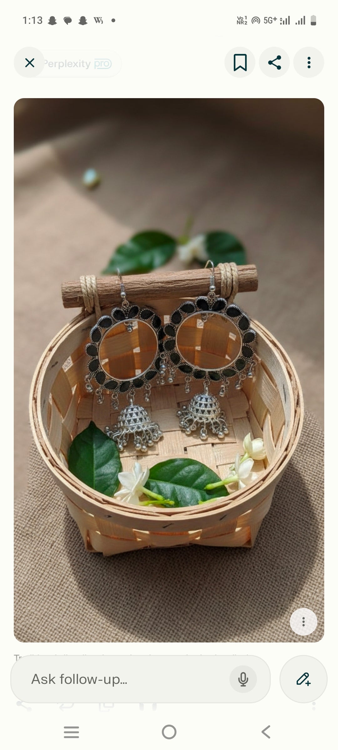 Blue Stone Jhumka" or "Oxidised Silver Blue Beads Peacock Design Dangler Earrings".